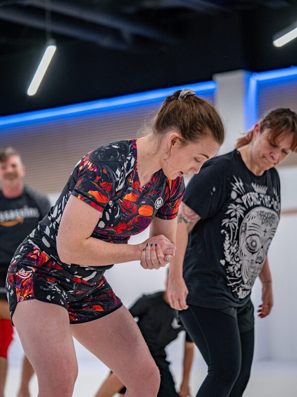 Makilla hand fights with a training partner during a no-gi round