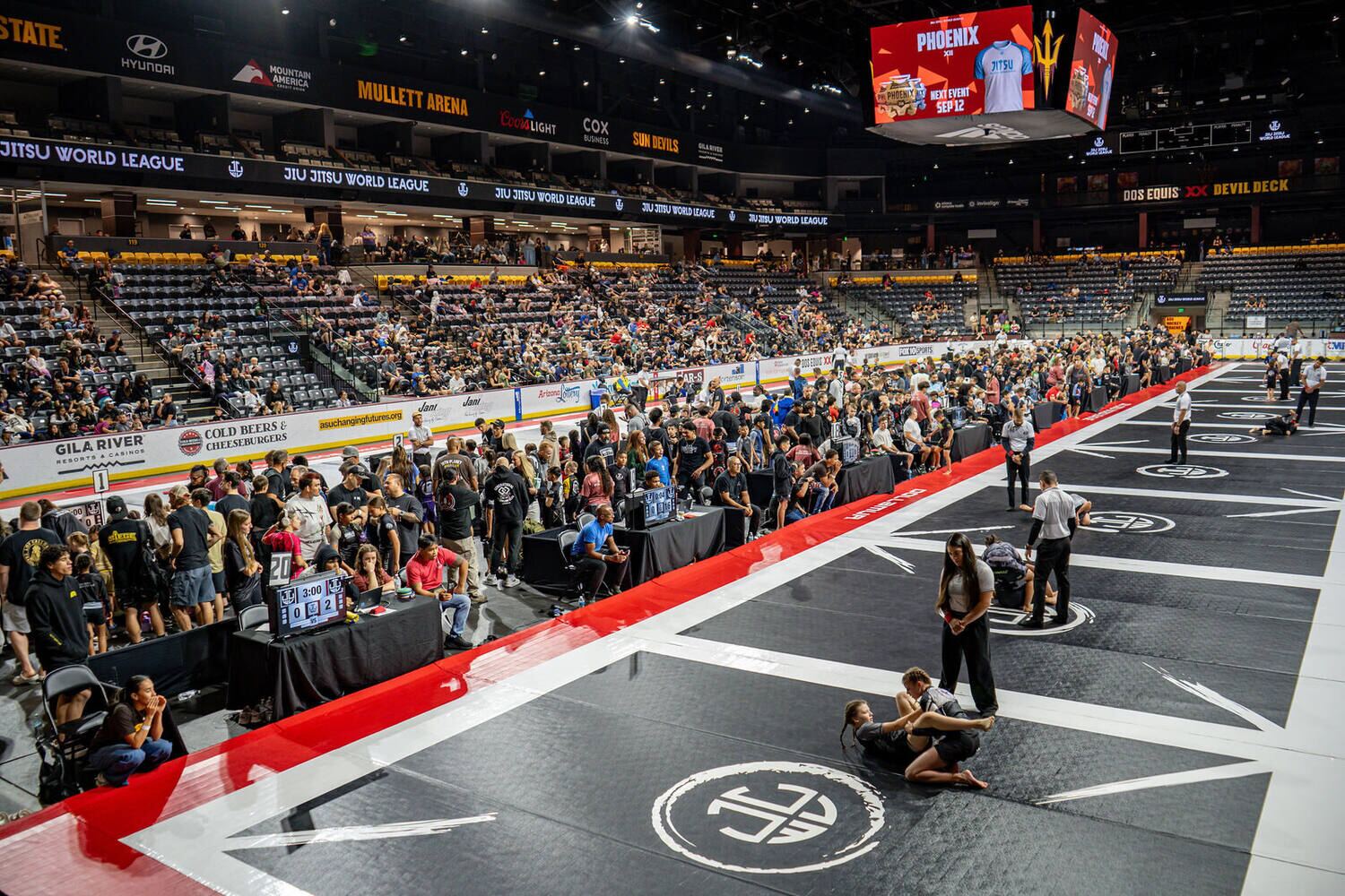 The competition floor at a packed Jiu Jitsu World League event